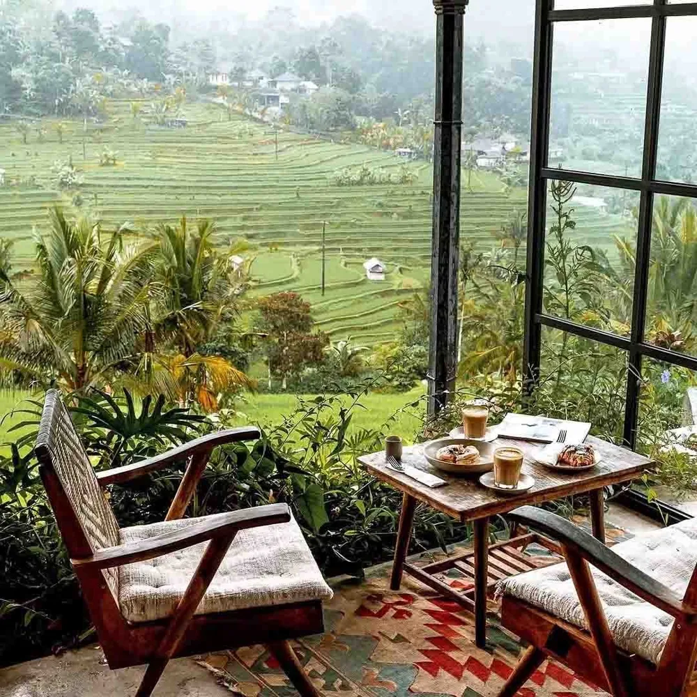 An open-air café overlooking rice terraces in Bali